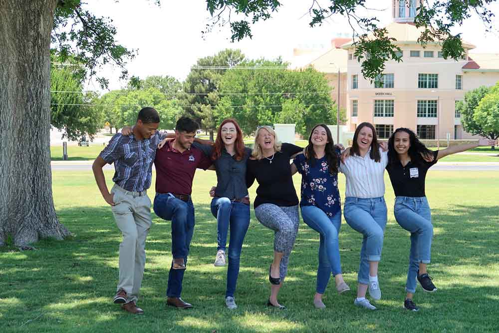 Dr. Jennifer Randall (center) and group of graduate students